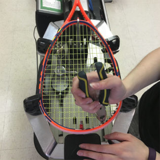 Squash racquet being strung in our Calgary store.
