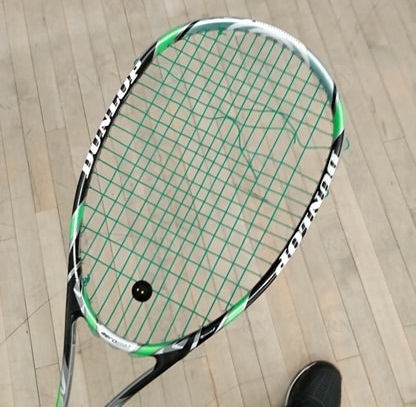 Squash Racquet with a Broken String